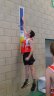 Reaching for the Vertical Jump board - 